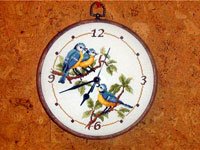 Вышитые оригинальные настенные часы, оформленные в пяльцы. Источник http://radikal.ru