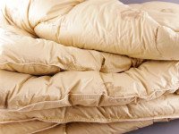 Хорошее одеяло из верблюжьей шерсти будет актуальным для использования в любое время года. Источник http://www.darimnastroenie.ru